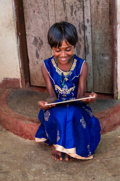 istock Sri Lankan young girl using a digital tablet 2199025465