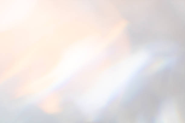 istock Artistic lens flare bokeh light leak reflections creating cozy morning background and serene setting 2199029585