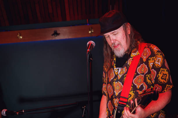 istock Rock guitarist playing in rehearsal studio 2199031090