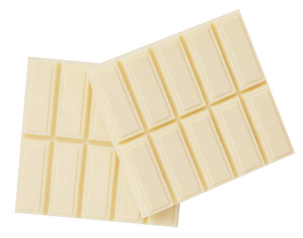 istock White chocolate bar pieces isolated. Broken  Milk chocolate chunks on white background. Top view. Flat lay. Package design elements  2199036383