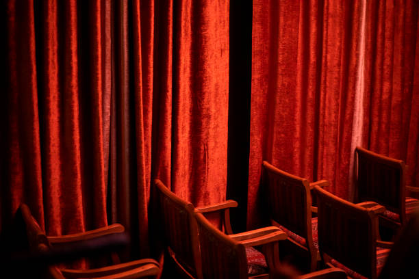 istock stylish interior with velvet red curtain and chairs 2199038555