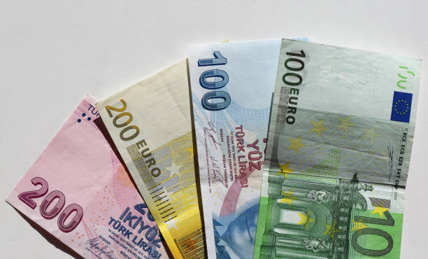 istock Euro and Turkish Lira banknotes with White Background 2199039130