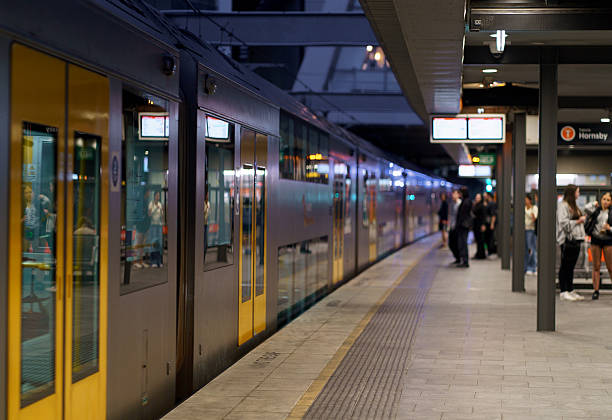 Sydney, Australia, 10 October 2024 -People boarding  a train at  Chatswood train station