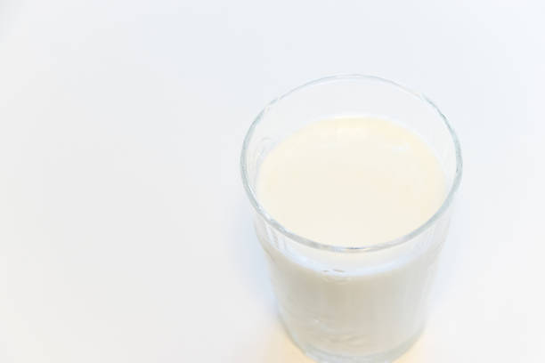 Milk being poured into a glass