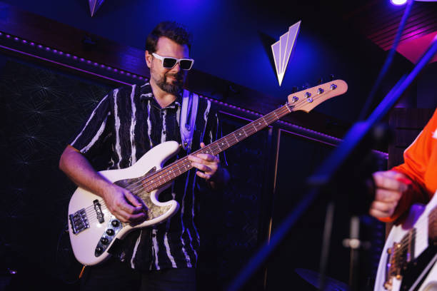 istock Bass player playing in an band 2199041883