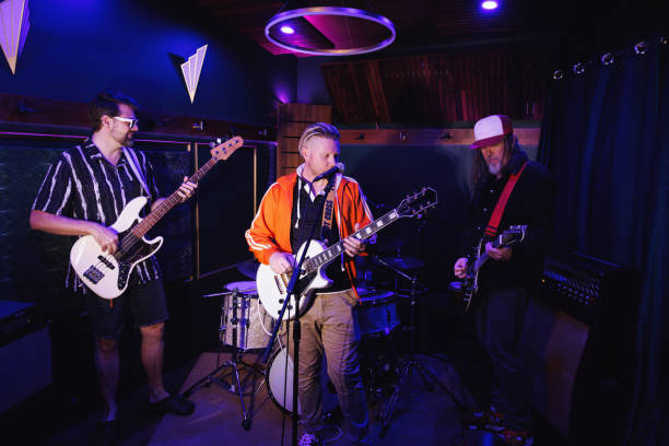 istock Middle aged men getting the band together for a jam session 2199042052