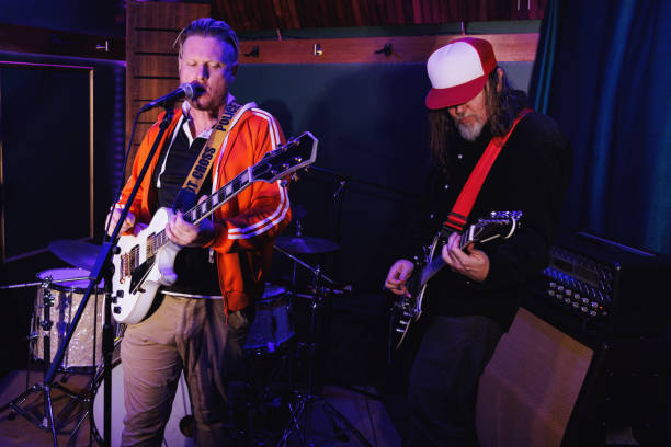 istock Middle aged men getting the band together for a jam session 2199042114