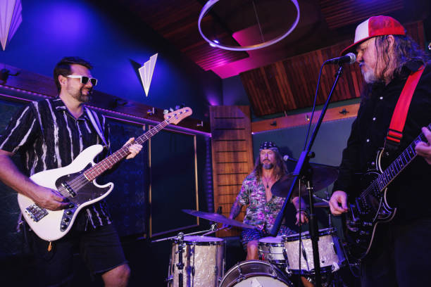 istock Middle aged men getting the band together for a jam session 2199042398