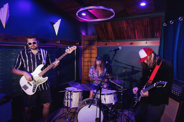 istock Middle aged men getting the band together for a jam session 2199042430