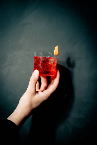 istock Red drink with ice and orange peel 2199042562
