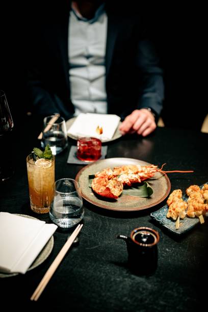 Gourmet dining with seafood and cocktails.