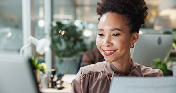 istock Business, woman and documents by computer in office for data entry in CRM system and online sales report. Account representative, employee and happy with client information update and portfolio review 2199045717