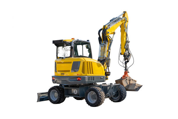 istock Yellow-gray construction machine with a large yellow bucket. The machine is parked on a white background. Tractor isolated on a white background 2199047965