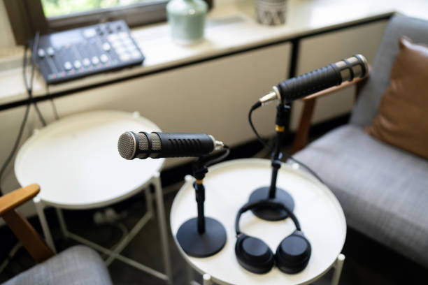 istock Professional Podcast Recording Setup With Microphones and Headphones in Studio Setting 2199055297