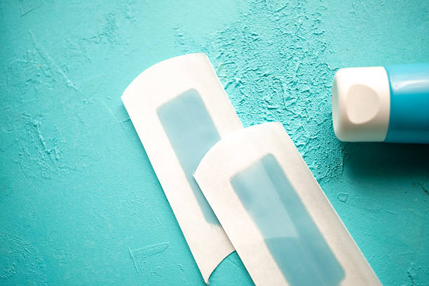 istock Close-up of blue wax strips large size on a blue background 2199057495