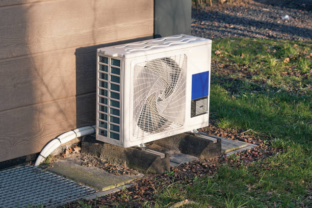 istock Air Source Heat Pump Outside a Vacation Cottage on a Holiday Park 2199062255