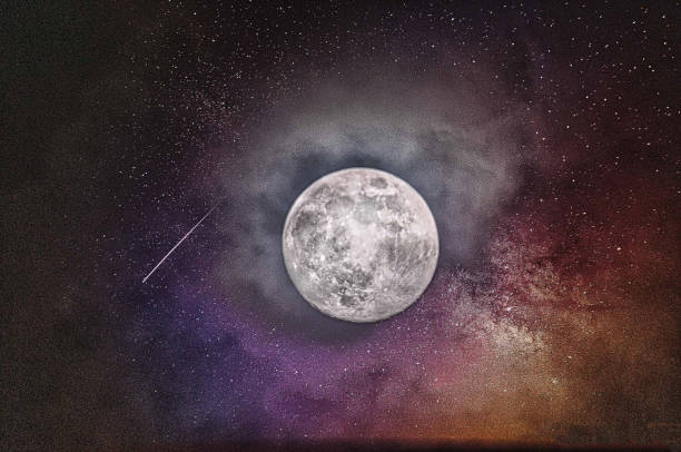 istock Full super moon over dark black sky at night 2199070905