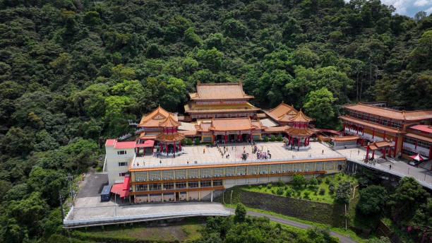 istock Sanching Temple perched in lush greenery of Taiwan with visitors exploring the serene grounds 2199071271