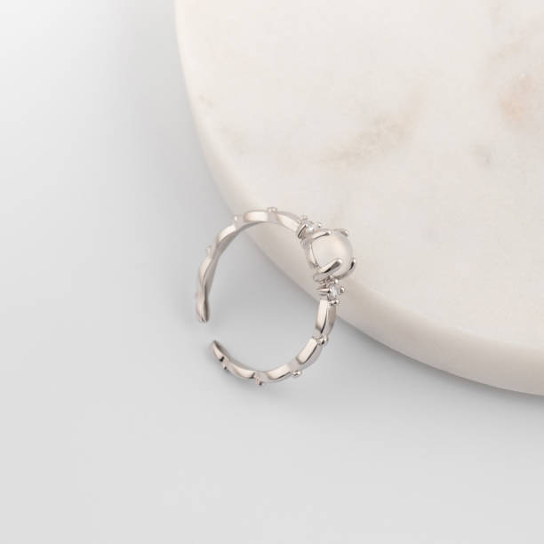 istock A silver ring with a stone on a white background. jewelry catalog. 2199074106
