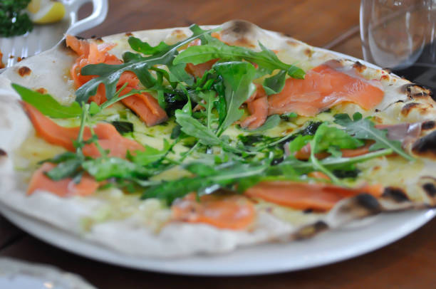 istock salmon pizza or salmon and vegetable pizza , smoked salmon pizza 2199075313