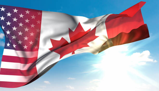 istock Canadian Flag Turns Into US Flag 2199078591