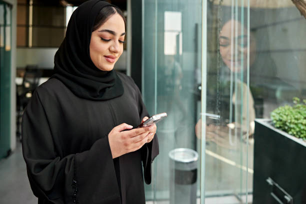 istock Young Riyadh businesswoman taking a break to use phone 2199080928