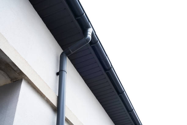 istock Roof drainage system installed on modern building exterior in bright daylight 2199081224