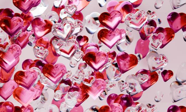 istock Abstract Valentine's Day Background with Floating Glass Hearts in Red and Pink 2199081689