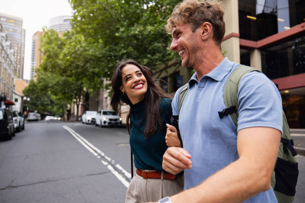 istock Happy Young Couple Exploring Urban Streets on a Sunny Day 2199083942