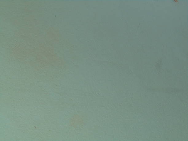istock abstract grunge background of old green-painted wall with broken paint 2199085991