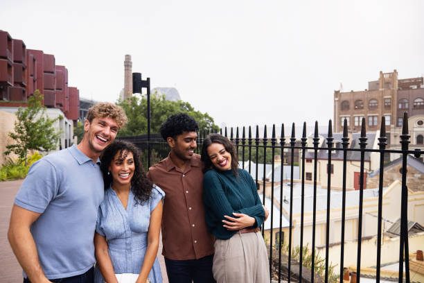 istock Group of Friends Enjoying Time Together Outdoors in an Urban Setting 2199087553