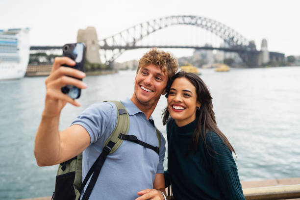 istock Couple Taking a Selfie at a Sydney Harbour Bridge 2199088947