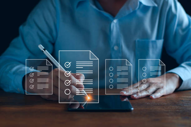 istock Businessman working with tablet. Checking mark up on the check boxes. Successful completion of business tasks. Digital marketing of statistics level up of graph. Business management goal strategy. 2199091051