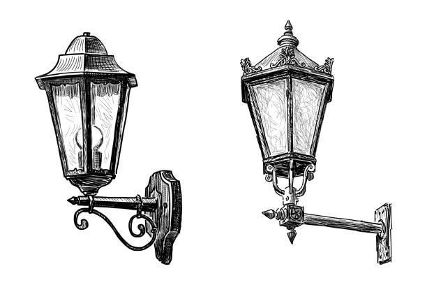 Sketch of two vintage street lamps, retro ornate lanterns, vector hand drawing isolated on white