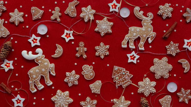 istock Christmas Gingerbread Cookies Festive Pattern Top View Red Background 2199091791