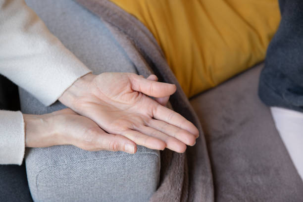 istock An adult's open hands rest on a sofa, symbolizing patience, trust, and connection. This gesture conveys calmness, readiness to give or receive, and emotional openness in a peaceful home setting. 2199103783
