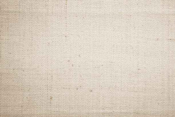 istock Brown sackcloth woven texture background in natural pattern. Jute hessian burlap, linen background in light beige cream color blank. Weaving canvas fiber line cotton cloth textured as organic. 2199108163