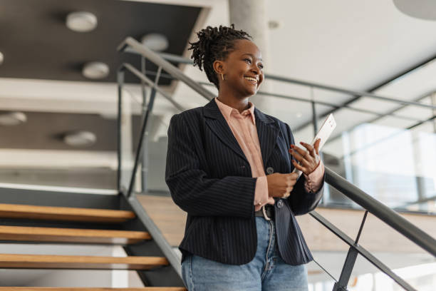 istock Smiling Professional in Stylish Office Attire 2199109730