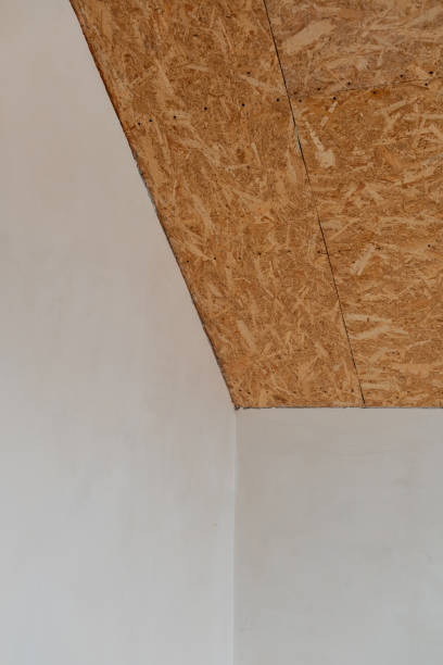 istock Room with an OSB ceiling and unfinished walls is under construction 2199110073
