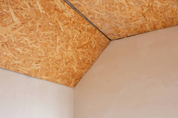 istock Wooden ceiling construction in a modern room at home renovation site 2199110129