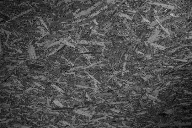 A close-up view of a textured surface made from compressed wood materials.