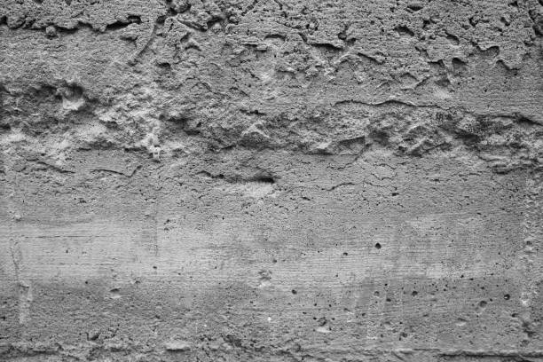 istock Textured gray concrete surface with imperfections in urban setting 2199110145