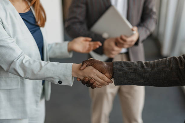 istock Close-Up of Handshake and Engagement Details 2199110924