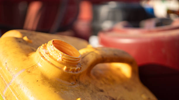 istock Used engine oil or hydraulic motor oil gallon. 2199110944