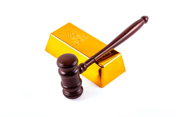 Gold bar and judge's gavel