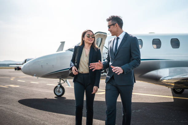 istock Asian Business Leaders Alight from Private Jet 2199112383