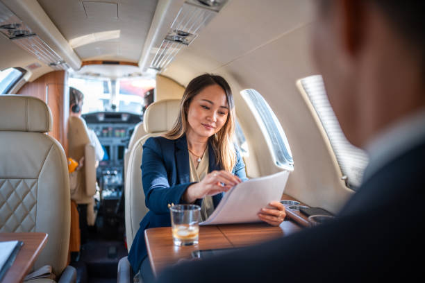 istock Asian Business Executives Working in Private Aircraft 2199112404