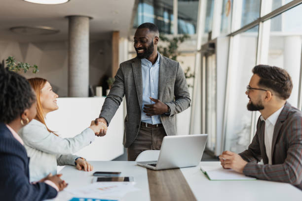 istock Business Meeting Handshake In Modern Office Space 2199112839