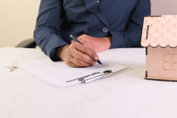 istock Signing documents for a new home purchase agreement 2199115118