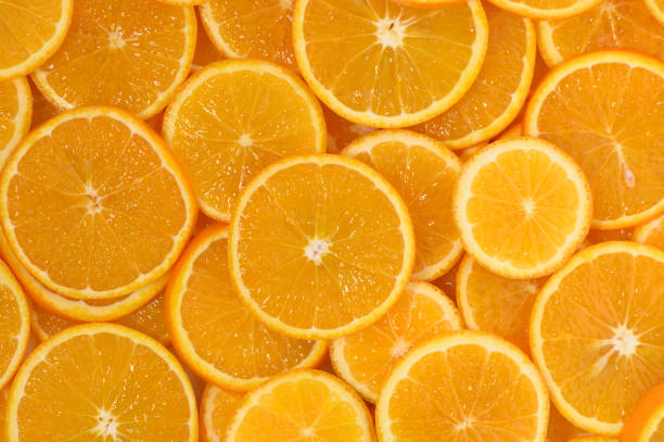 istock Freshly sliced oranges arranged beautifully on a surface inviting vibrant summertime flavors 2199115975